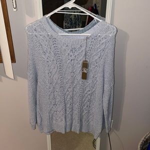 Baby blue sweater with bow detailing